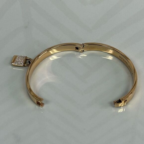 Michael Kors Goldtone Iconic Pace Lock Hinged Bracelet - Picture 7 of 7